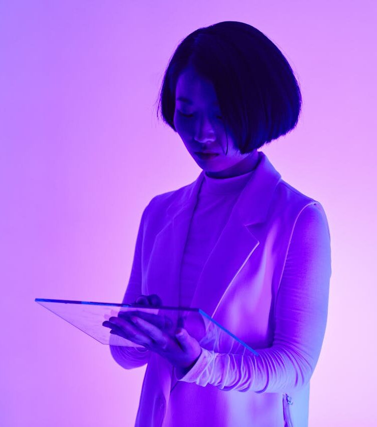 A Woman Holding a Digital Tablet